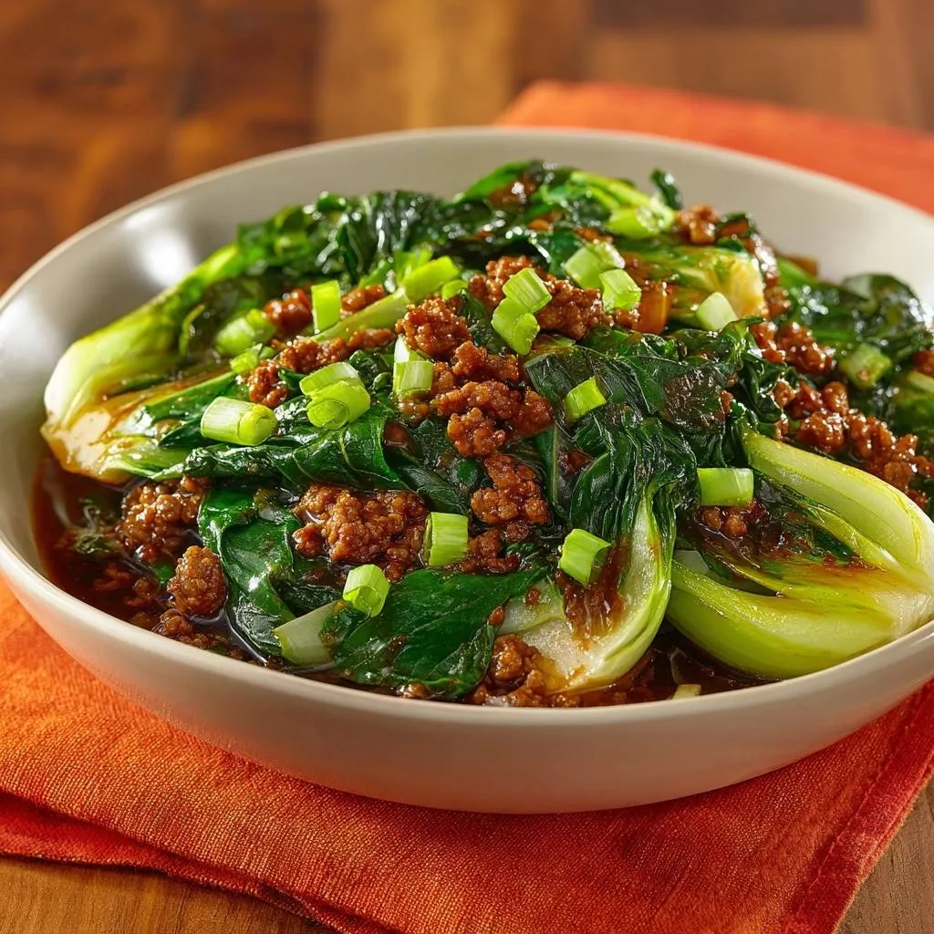 Beef bok choy stir-fry with a savory minced beef topping and chopped green onions.
