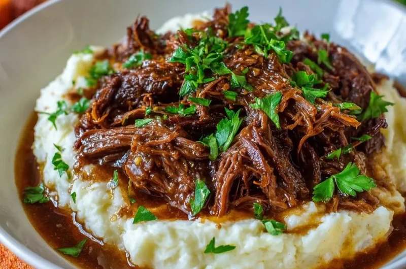 Shredded Braised Beef over Creamy Mashed Potatoes