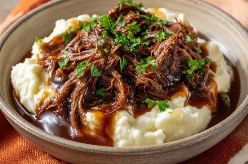 Tender Shredded Beef over Creamy Mashed Potatoes